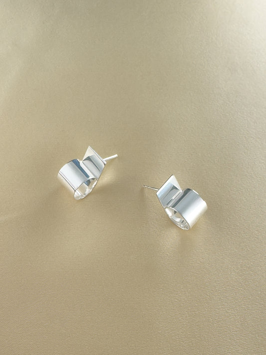 Cut earrings in silver by Sara Robertsson Jewellery