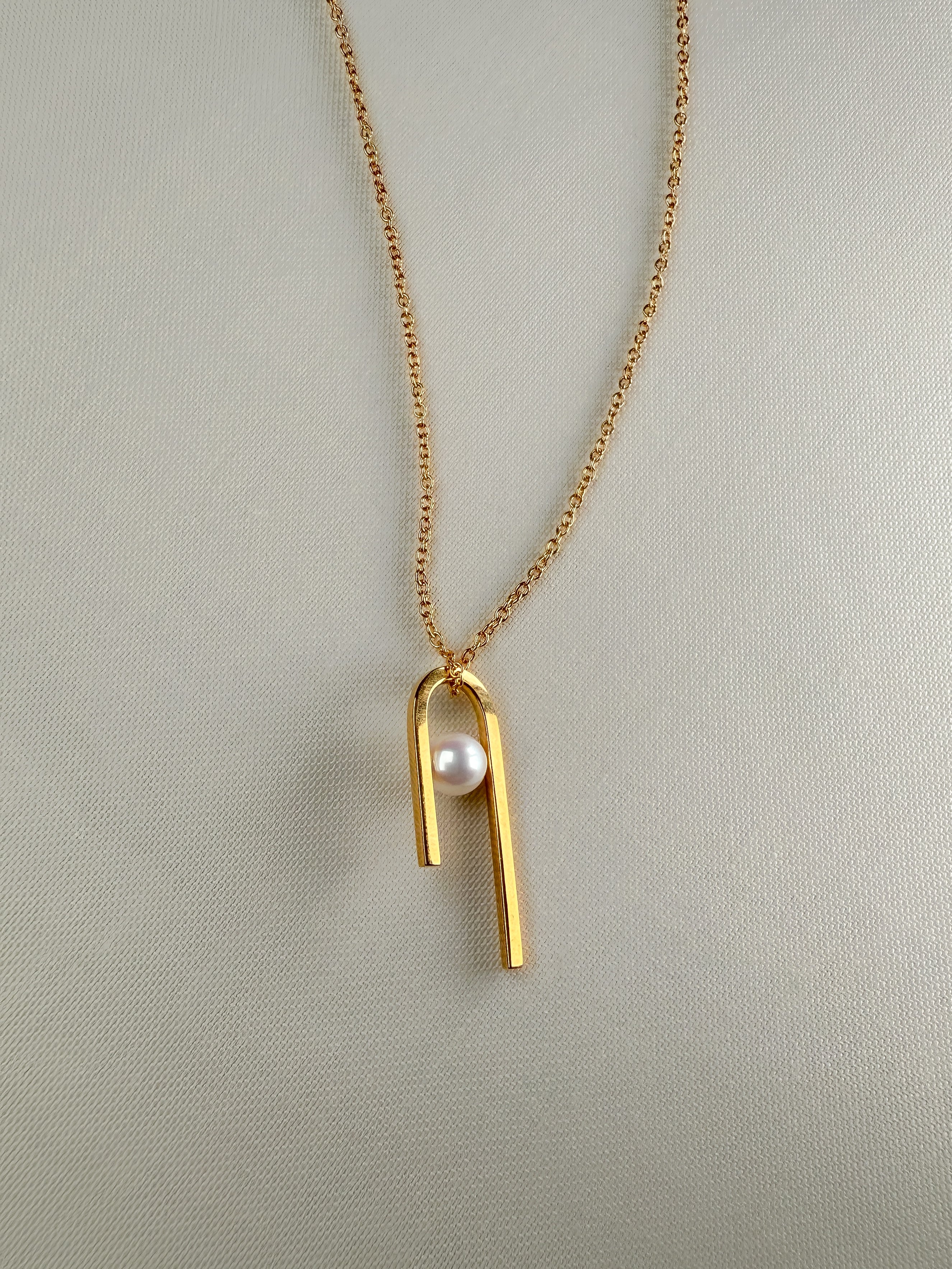 String pendant in gold vermeil with freshwater pearl by Sara Robertsson Jewellery