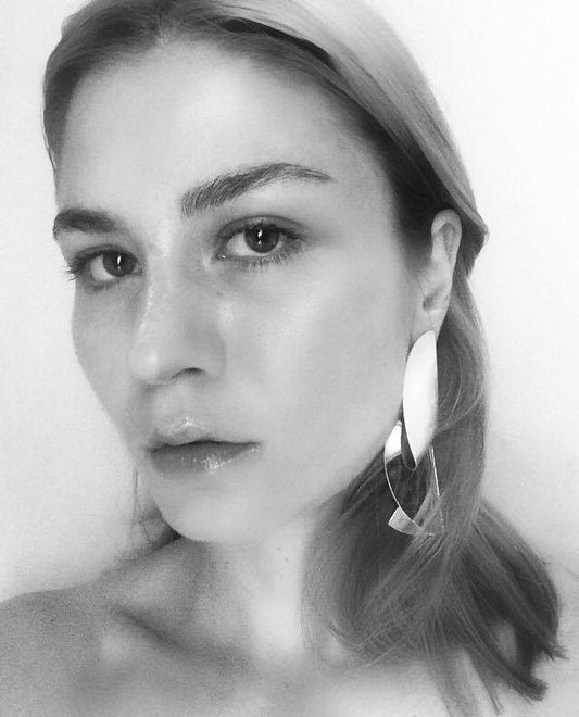 Malin Buska in PLEAT earring by Sara Robertsson Jewellery