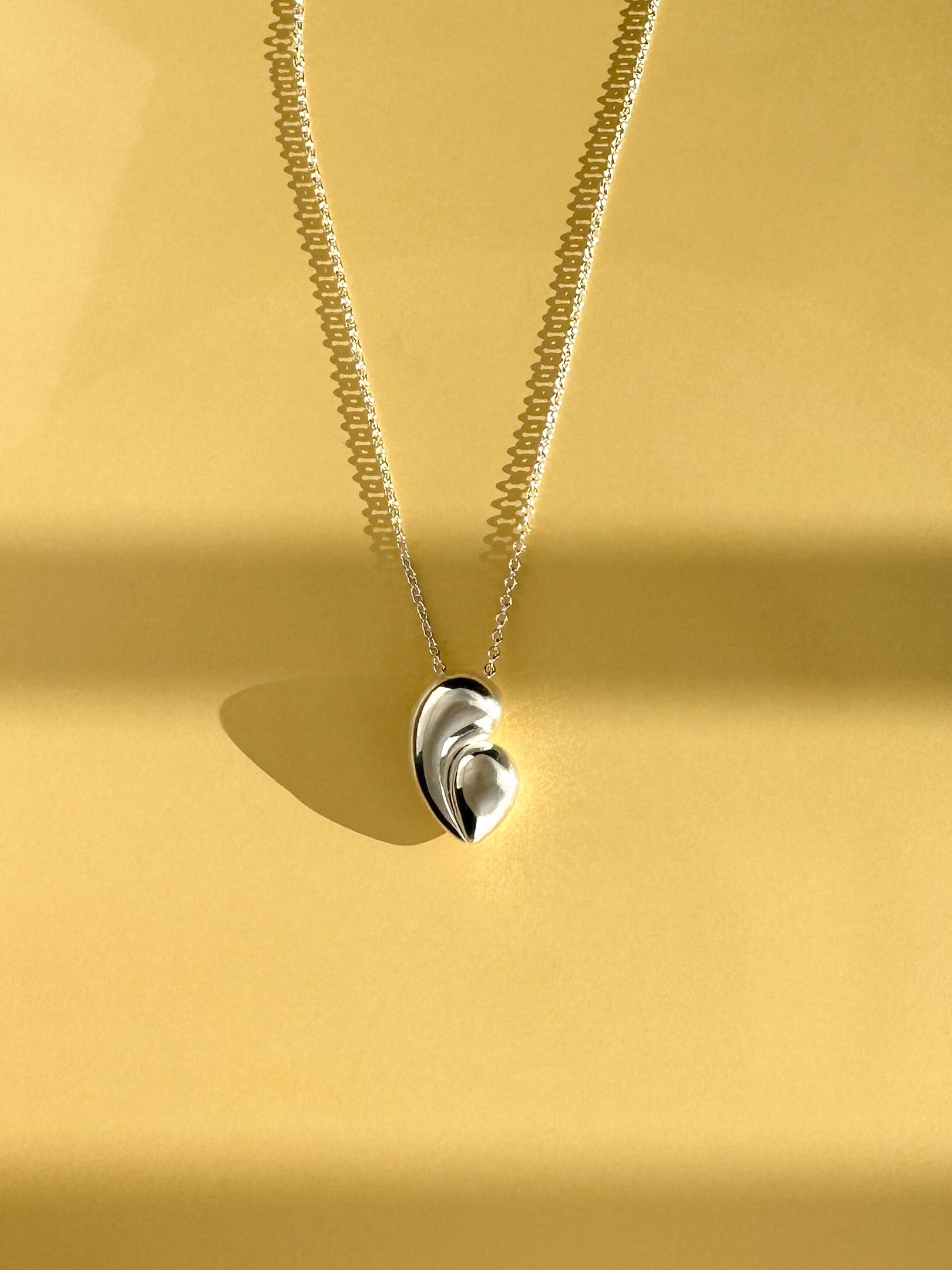 Mother's Heart pendant in silver by Sara Robertsson Jewellery