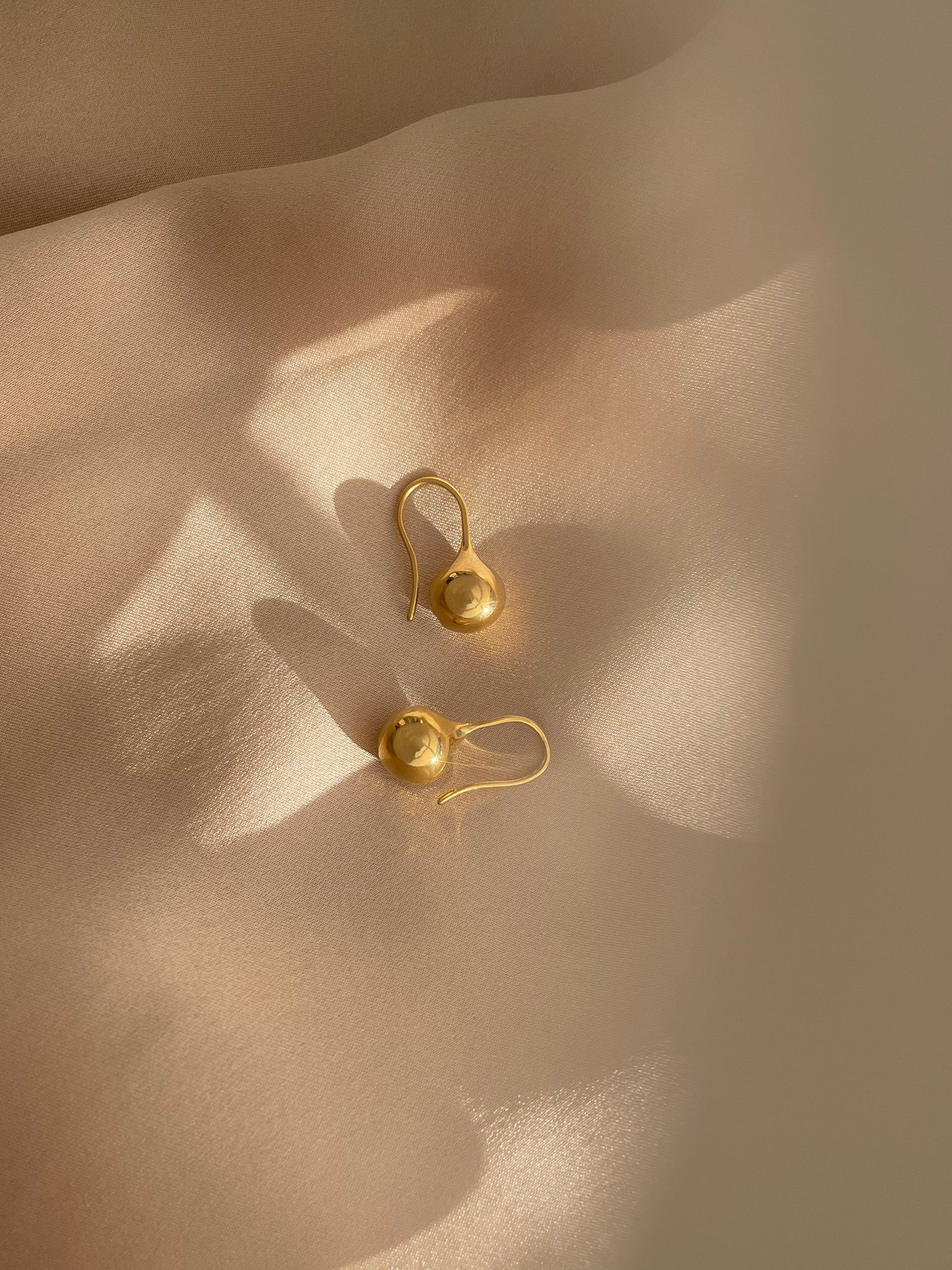 All earrings by Sara Robertsson Jewellery