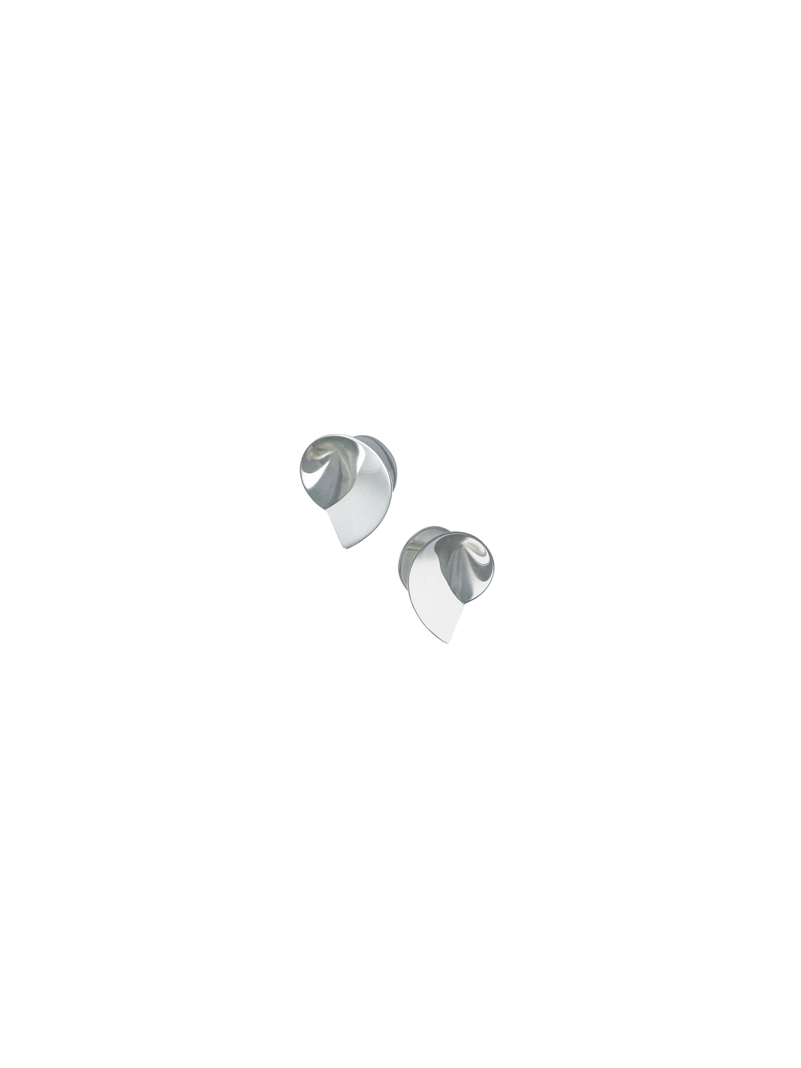 Coil II sculptural handmade earrings in silver by Sara Robertsson Jewellery
