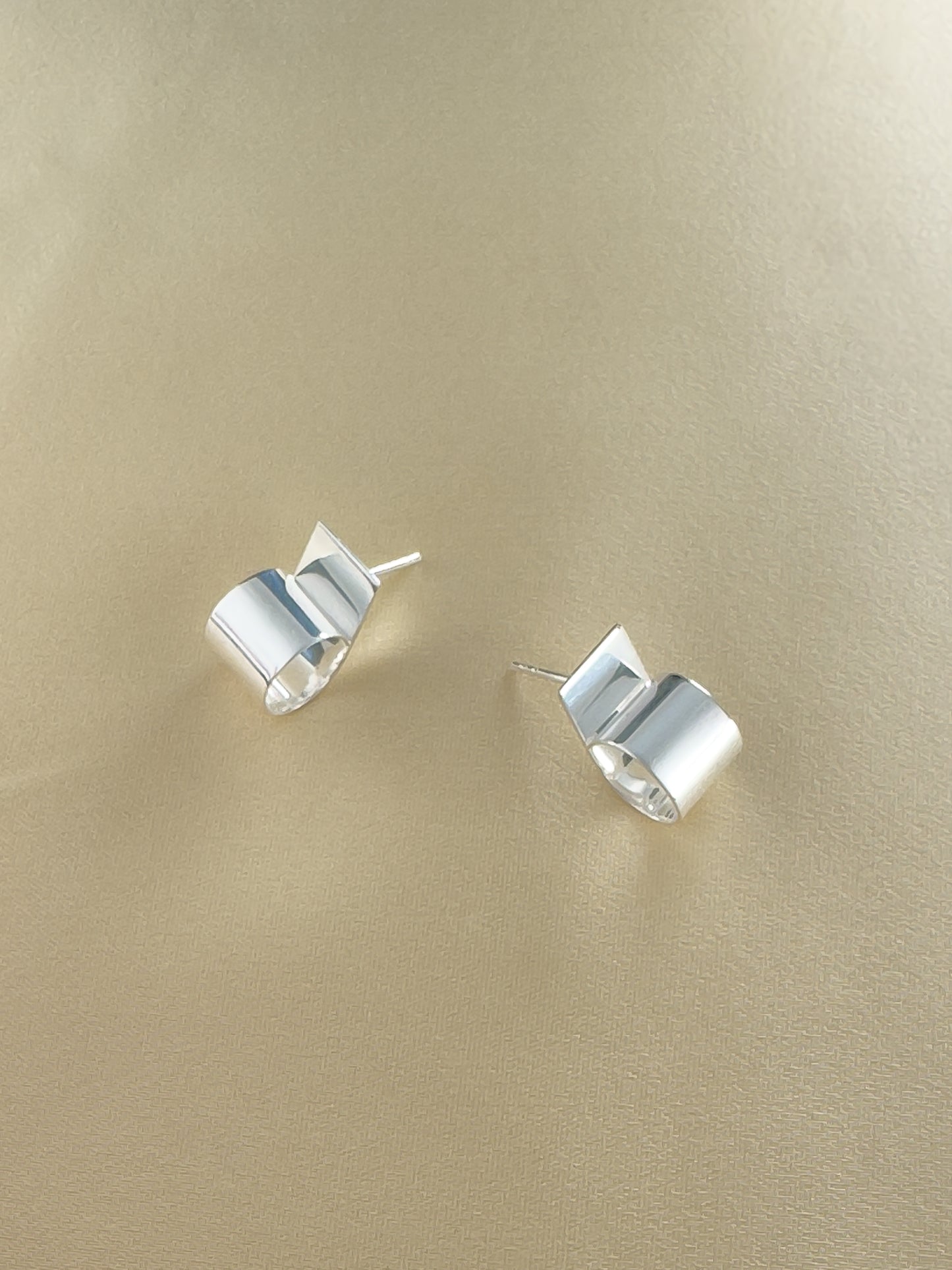 Cut earrings in silver by Sara Robertsson Jewellery