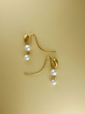 Pendant earrings in gold vermeil with double freshwater pearls by Sara Robertsson Jewellery