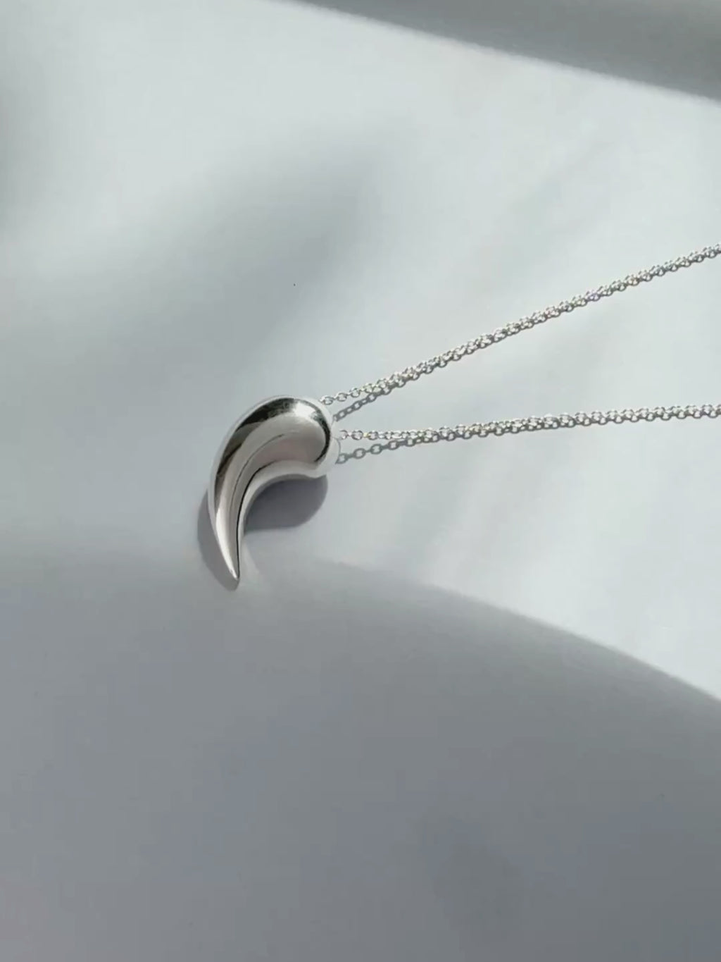 Breathe sculptural pendant in recycled silver by Sara Robertsson Jewellery