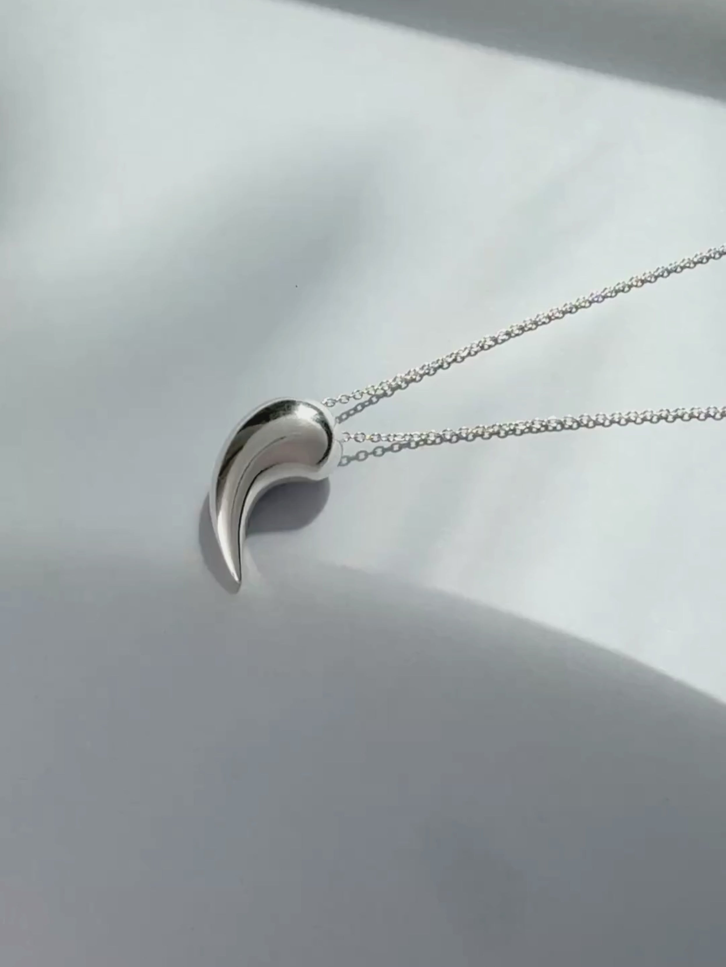 Breathe sculptural pendant in recycled silver by Sara Robertsson Jewellery