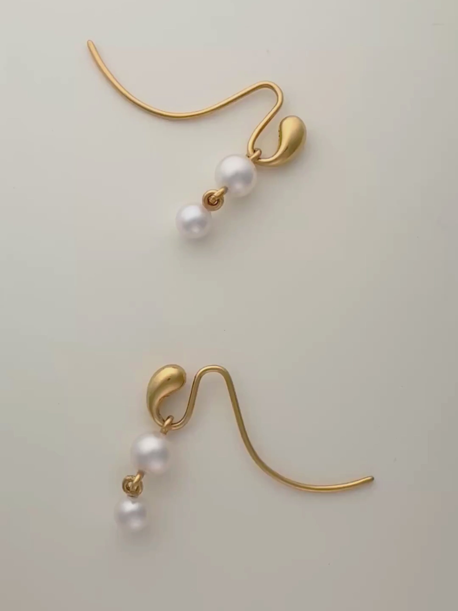 Pendant earrings in gold vermeil with double freshwater pearls by Sara Robertsson Jewellery