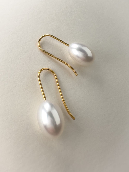 Egg pearl earrings in gold vermeil by Sara Robertsson Jewellery