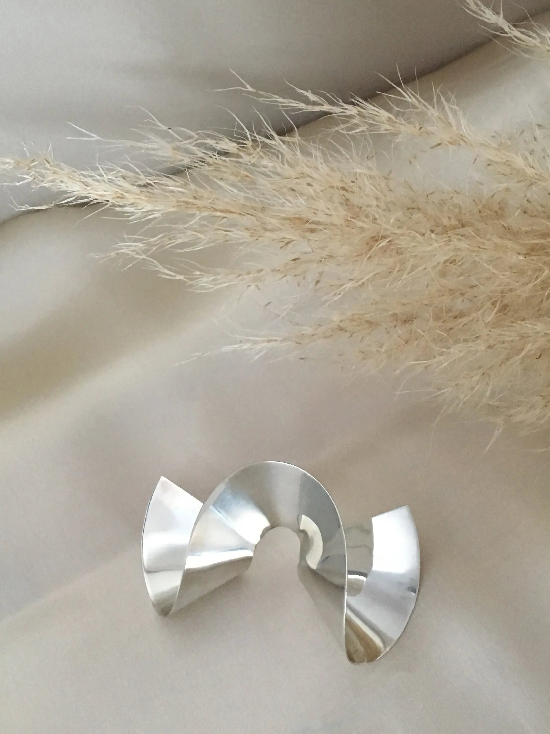 Flounce Single poetic sculptural handmade Earring In Silver Sara Robertsson Jewellery